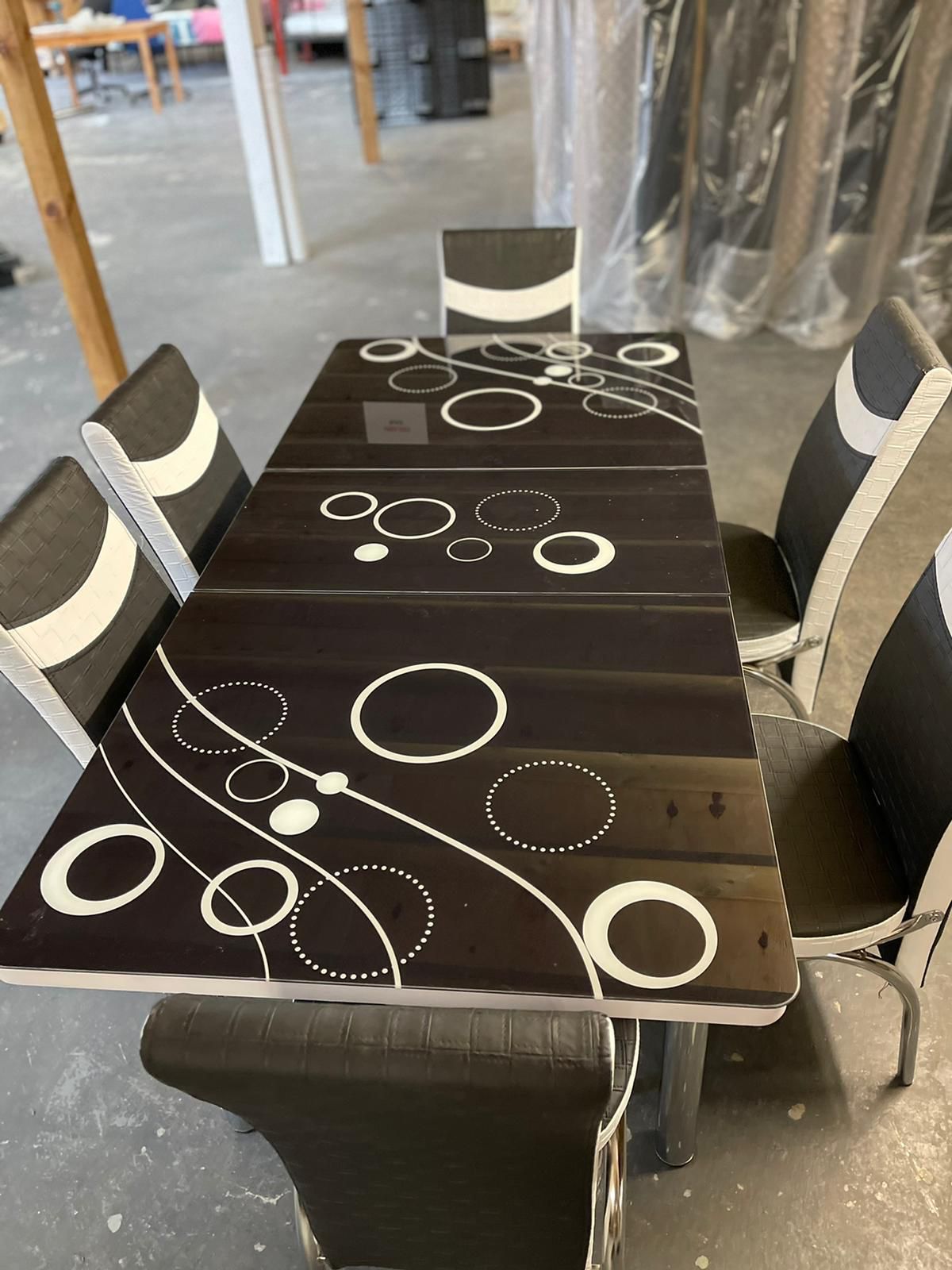 BLACK BUBBLE DINING TABLE AND CHAIRS