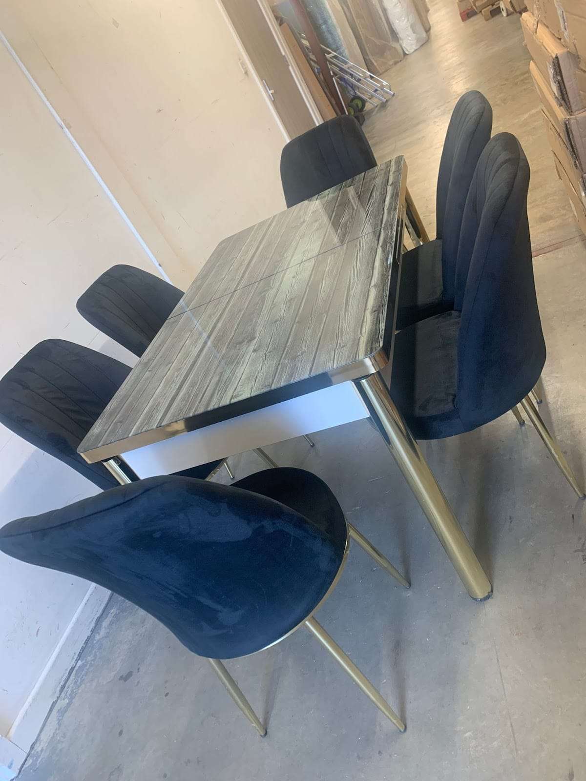 GREY WOODEN EFFECT TABLE WITH BLACK STAR FABRIC CHAIR WITH GOLD LEG